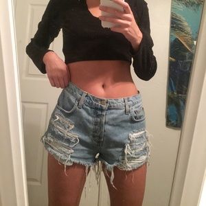Distressed denim shorts.